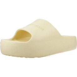 Sandały TOMMY JEANS CHUNKY POOL SLIDE ESS Żółty. Żółte sandały damskie Tommy Hilfiger, bez wzorów, z gumy, bez obcasa. Za 253.99 zł.