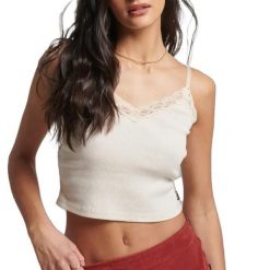 Prążkowany tank top z koronkowym wykończeniem Superdry. Białe topy damskie Superdry., bez wzorów, z koronki, bez kołnierzyka. Za 82.90 zł.