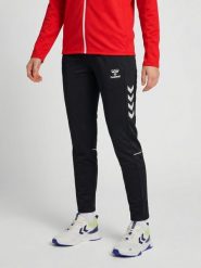 Damskie spodnie dresowe Hummel Core 2.0 Woven. Białe spodnie sportowe damskie HUMMEL, s, z dresówki, na fitness i siłownię. Za 269.50 zł.