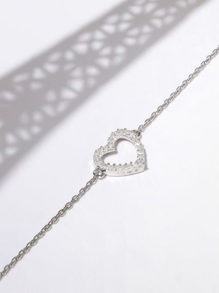 CARATELLI Złota bransoletka "Tu portes mon Coeur" z diamentami rozmiar: onesize. Szare bransoletki damskie CARATELLI, złote. Za 739.71 zł.