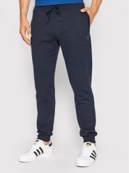 Guess Spodnie dresowe Z2YB22 KAIJ1 Granatowy Regular Fit. Niebieskie spodnie dresowe męskie Guess, z aplikacjami, z bawełny. Za 279.99 zł.