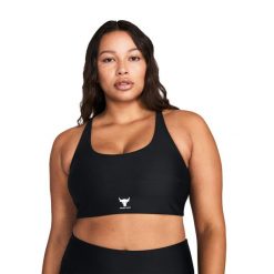 Biustonosz fitness Under Armour Project Rock All Train Crossback. Czarne biustonosze sportowe damskie Under Armour, bez wzorów. Za 189.99 zł.
