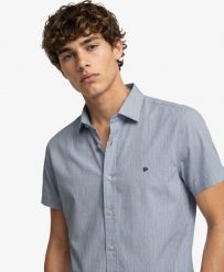 Superdry Koszula Riviera z krótkim rękawem, len – Ticking Navy Stripe. Niebieskie koszule damskie Superdry., na lato, m, bez wzorów, ze lnu, bez kołnierzyka, bez ramiączek. Za 335.95 zł.