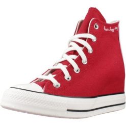 Buty CONVERSE CHUCK TAYLOR ALL STAR WEDGE Bordeaux. Czerwone buty sportowe na co dzień damskie Converse, bez wzorów, z tkaniny. Za 387.99 zł.