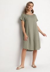 Zielona Rozkloszowana Wiskozowa Sukienka Trivoria. Zielone sukienki damskie Born2be, na co dzień, l, bez wzorów, z materiału, eleganckie, bez kołnierzyka, bez ramiączek, midi, rozkloszowane. Za 59.99 zł.