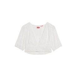 Koszulka damska z koronkowym wykończeniem Superdry Ibiza. Białe bluzki damskie Superdry., l, bez wzorów, z koronki, boho, bez kołnierzyka, bez ramiączek. Za 284.00 zł.