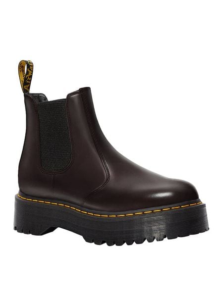 Dr. Martens Skórzane sztyblety w kolorze bordowym rozmiar: 40. Czerwone botki damskie Dr. Martens, sportowe, z okrągłym noskiem, bez obcasa, na platformie, bez zapięcia. Za 524.62 zł.