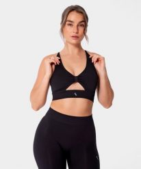 Bezszwowy biustonosz sportowy z wycięciem Carpatree Eris. Niebieskie biustonosze sportowe damskie Carpatree, bez wzorów, z elastanu. Za 119.99 zł.