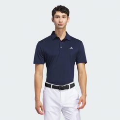 Koszulka polo Ultimate365 Solid. Niebieskie koszulki polo męskie Adidas, m, bez wzorów, z materiału, bez ramiączek. Za 259.00 zł.
