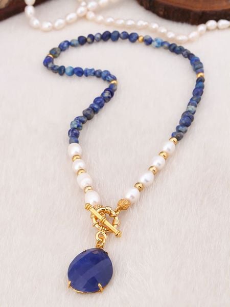 L'Atelier de Gaia Pozłacany naszyjnik z elementami ozdobnymi - dł. 50 cm rozmiar: onesize. Białe naszyjniki damskie L'Atelier de Gaia, pozłacane. Za 100.45 zł.