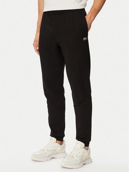 Lacoste Spodnie dresowe XH9833 Czarny Regular Fit. Czarne spodnie dresowe męskie Lacoste, bez wzorów, z bawełny. Za 549.99 zł.