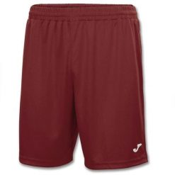 Spodenki do piłki nożnej męskie Joma Nobel. Brązowe szorty męskie Joma, bez wzorów, z poliesteru, sportowe. Za 142.99 zł.