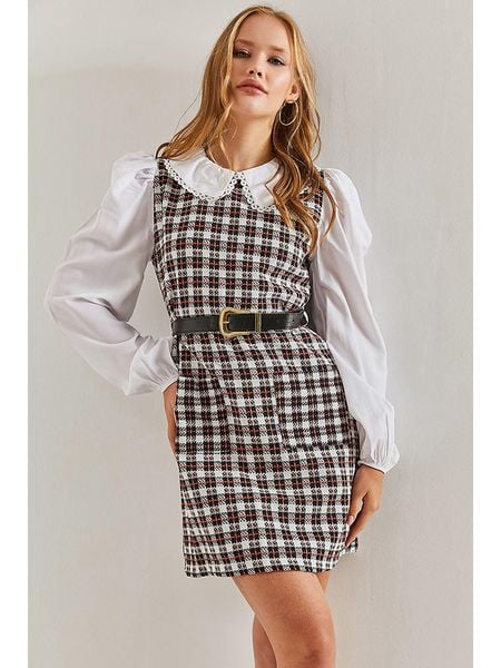 Bianco Lucci Sukienka w kolorze czarno-białym rozmiar: M. Białe sukienki damskie Bianco Lucci, m, bez wzorów, ze skóry, bez kołnierzyka, bez ramiączek, mini. Za 130.99 zł.