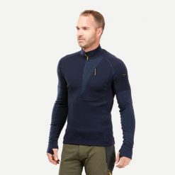 Koszulka męska trekkingowa z długim rękawem Forclaz MT900 merino. Niebieskie koszulki męskie z długim rękawem FORCLAZ, l, z dzianiny. Za 299.99 zł.