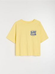 Bawełniana koszulka z napisem Surf Club - yellow jeans. Żółte t-shirty damskie Sinsay, l, bez wzorów, z bawełny, bez kołnierzyka. Za 25.99 zł.