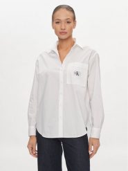 Calvin Klein Jeans Koszula J20J222610 Biały Relaxed Fit. Białe koszule damskie Calvin Klein Jeans, l, bez wzorów, z bawełny, bez kołnierzyka, bez ramiączek. Za 239.99 zł.