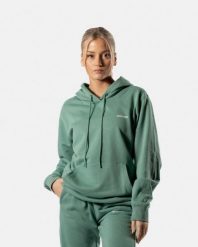 Damska bluza z kapturem 365 oversize z kieszenią kangurką – ciemnozielony. Zielone bluzy sportowe damskie AESTHETIC WOLF, s, z bawełny. Za 159.99 zł.