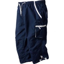 Spodnie 3/4 z mikrofazy, z gumką w talii. Niebieskie spodnie sportowe męskie bonprix. Za 109.99 zł.