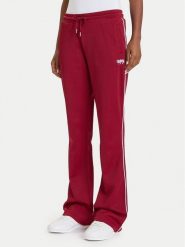 Guess Spodnie dresowe W5BB58 FL04W Bordowy Regular Fit. Czerwone spodnie dresowe damskie Guess, l, z aplikacjami, z dresówki. Za 309.99 zł.