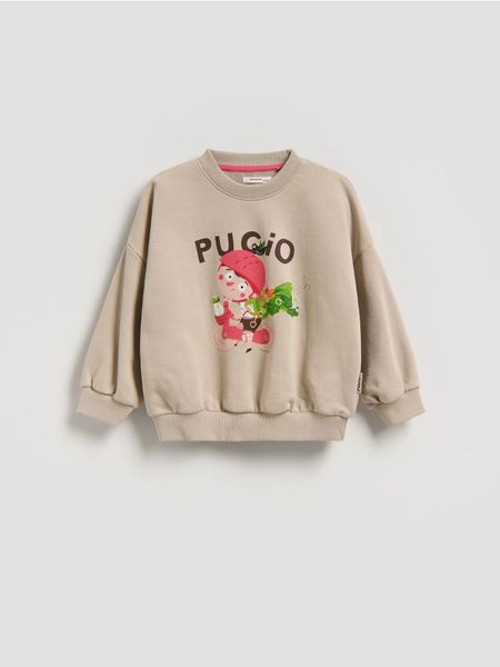 Bawełniana bluza Pucio - beżowy. Brązowe bluzy i bluzki niemowlęce Reserved, bez wzorów, z bawełny, bez ramiączek, bez kaptura. Za 49.99 zł.