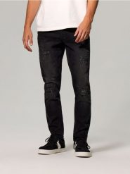 Jeansy slim fit z przetarciami i efektem sprania - czarny. Czarne jeansy męskie Sinsay. Za 79.99 zł.