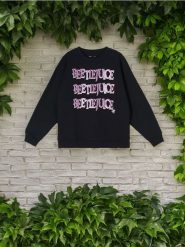 Bluza Beetlejuice - czarny. Czarne bluzy bez kaptura damskie Sinsay, l. W wyprzedaży za 24.99 zł.