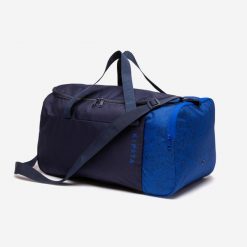 Torba sportowa Kipsta Essential 35 l. Niebieskie torby podróżne damskie KIPSTA, bez wzorów, z materiału. Za 44.99 zł.
