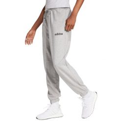 Spodnie damskie adidas Essentials Linear French Terry Cuffed. Szare spodnie dresowe damskie Adidas, z bawełny, na fitness i siłownię. Za 157.99 zł.
