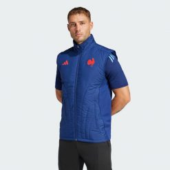 Bezrękawnik France Winterized. Niebieskie kamizelki męskie Adidas, xs, z materiału. W wyprzedaży za 209.50 zł.