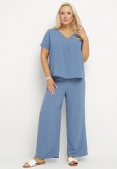Niebieski Komplet o Fasonie Oversize Bluzka i Szerokie Spodnie Amisora. Niebieskie spodnie materiałowe damskie Born2be, bez wzorów. Za 79.99 zł.