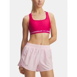 Biustonosz sportowy UA Crossback Mid Bra 1361034-681 S. Czerwone biustonosze sportowe damskie Under Armour, bez wzorów. Za 121.99 zł.