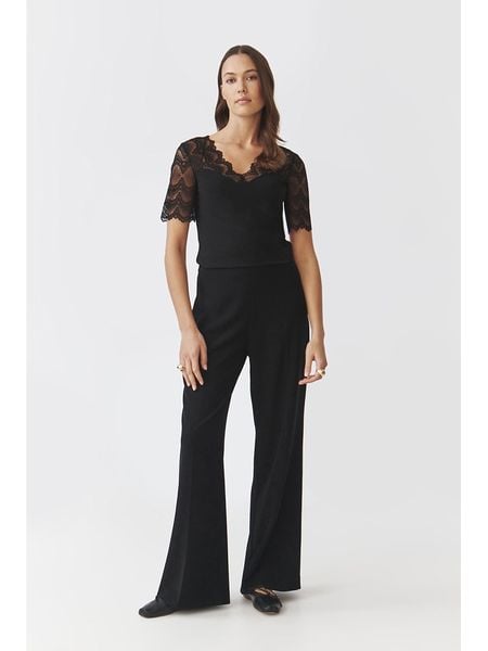 TATUUM Bluzka w kolorze czarnym rozmiar: M. Czarne bluzki damskie Tatuum, m, bez wzorów, z koronki, bez kołnierzyka, bez ramiączek. Za 97.45 zł.