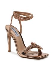 Steve Madden Sandały Unleash SM11002333-686 Złoty. Żółte sandały damskie Steve Madden, bez wzorów, z tworzywa sztucznego, bez obcasa, na szpilce. Za 499.99 zł.