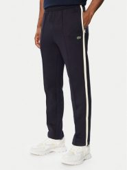 Lacoste Spodnie dresowe XH8615 Granatowy Regular Fit. Niebieskie spodnie dresowe męskie Lacoste, bez wzorów, z bawełny. Za 769.99 zł.