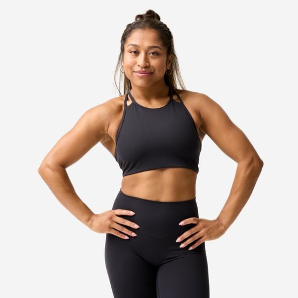 Stanik sportowy. Czarne biustonosze sportowe damskie Decathlon, bez wzorów, z elastanu. Za 89.99 zł.