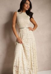 Beżowa Koronkowa Sukienka Taliowana Wilreti. Brązowe sukienki damskie Renee, na spotkanie biznesowe, m, bez wzorów, z koronki, eleganckie, bez kołnierzyka, bez ramiączek, maxi, dopasowane. W wyprzedaży za 125.99 zł.