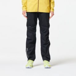 Spodnie do biegania w terenie przeciwdeszczowe damskie Kiprun Run 900 Rain. Czarne spodnie sportowe damskie KIPRUN, l, z materiału, do biegania. Za 189.99 zł.
