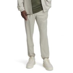 Spodnie treningowe Under Armour Herren Vibe Woven Jogger 1386557. Szare spodnie sportowe męskie Under Armour, z elastanu. Za 340.10 zł.