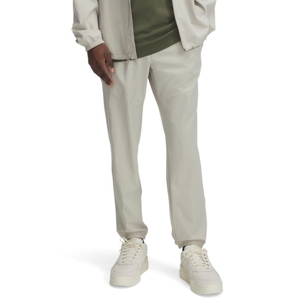 Spodnie treningowe Under Armour Herren Vibe Woven Jogger 1386557. Szare spodnie sportowe męskie Under Armour, z elastanu. Za 340.10 zł.