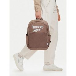 Plecak Reebok. Brązowe plecaki damskie Reebok, bez wzorów, sportowe. Za 69.99 zł.