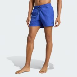 Szorty do pływania z marszczonego nylonu 5 INCH. Niebieskie szorty męskie Adidas, bez wzorów, z materiału, eleganckie. Za 179.00 zł.