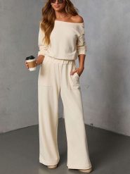 Milan Kiss 2-częściowy zestaw w kolorze beżowym rozmiar: M. Brązowe spodnie dresowe damskie Milan Kiss, m, bez wzorów, z dresówki. Za 172.08 zł.