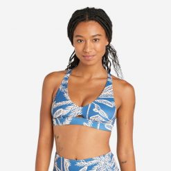 Góra kostiumu kąpielowego surfingowego damska Olaian Agatha Palmer. Niebieskie bikini damskie Decathlon, bez wzorów. Za 39.99 zł.