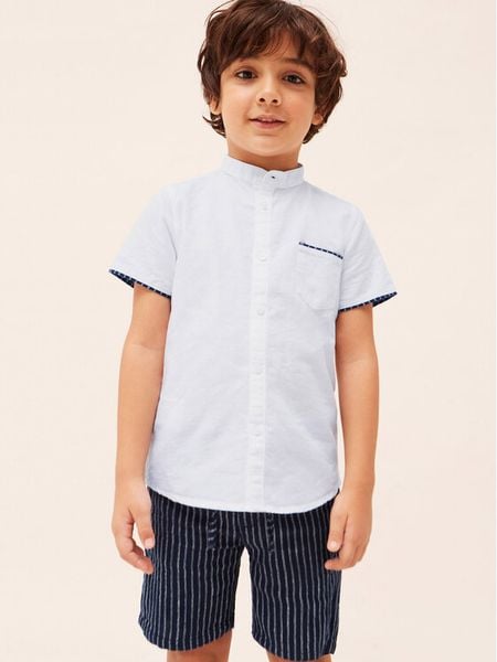 Mayoral Komplet koszula i szorty materiałowe 3240 Kolorowy Regular Fit. Koszule chłopięce Mayoral, bez wzorów, z bawełny, bez kołnierzyka, bez ramiączek. Za 169.99 zł.