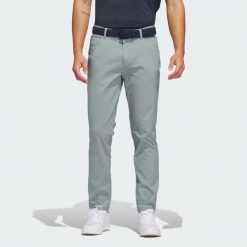 Spodnie Ultimate365 Five-Pocket. Niebieskie spodnie materiałowe męskie Adidas, bez wzorów, sportowe. Za 369.00 zł.
