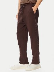 MICHAEL Michael Kors Spodnie dresowe CF552Q65MF Brązowy ciemny Regular Fit. Brązowe spodnie dresowe męskie MICHAEL Michael Kors, bez wzorów, z bawełny. Za 789.99 zł.