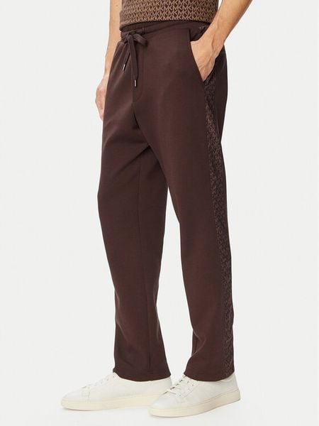 MICHAEL Michael Kors Spodnie dresowe CF552Q65MF Brązowy ciemny Regular Fit. Brązowe spodnie dresowe męskie MICHAEL Michael Kors, bez wzorów, z bawełny. Za 789.99 zł.