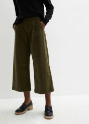 Szerokie spodnie sztruksowe culotte high-waist z wygodnym paskiem, dł. 7/8. Zielone spodnie materiałowe damskie bonprix, bez wzorów, ze sztruksu, z podwyższonym stanem. Za 119.99 zł.