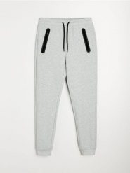 Spodnie dresowe slim - szary. Szare spodnie sportowe męskie Sinsay, z dresówki. Za 69.99 zł.