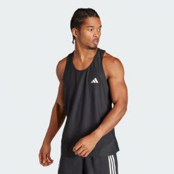 Koszulka Own The Run Tank. Czarne t-shirty sportowe męskie Adidas, xs, z materiału, bez ramiączek, do biegania. W wyprzedaży za 108.77 zł.